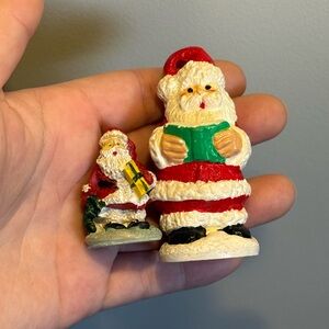Set of 2 Similar Resin Cast Vintage Santa Claus Christmas Figurines